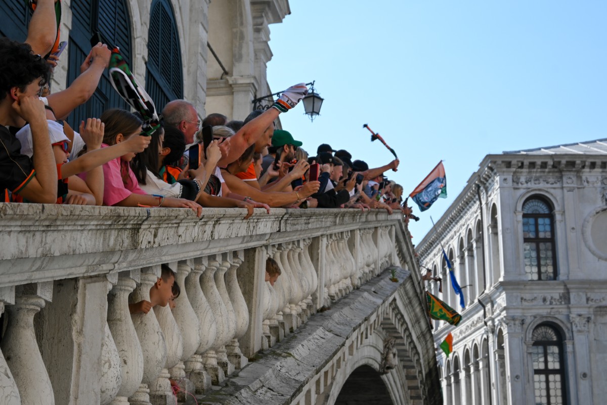 Venice FC fans celebrating on the Ponte di Rialto.
